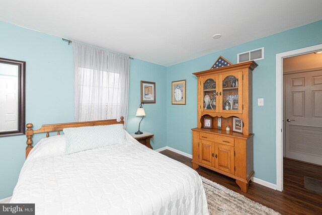 706 Melvin Rd, Telford, PA 18969 - bedroom with dark wood-style flooring and baseboards