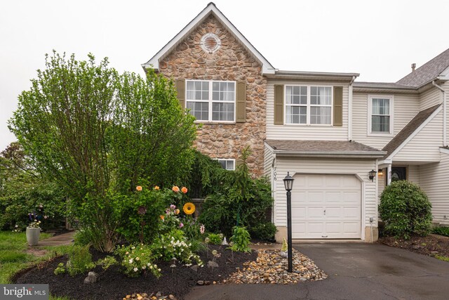 706 Melvin Rd, Telford, PA 18969 - view of front of property with stone siding, a garage, and driveway