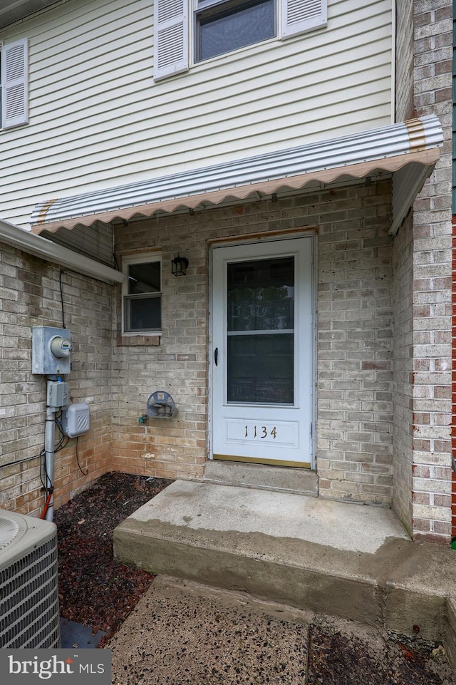 1134 Fox Run, Reading, PA 19606 - entrance to property featuring central air condition unit and brick siding