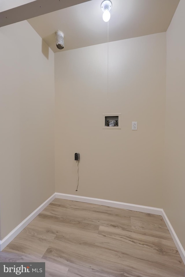 1134 Fox Run, Reading, PA 19606 - washroom with washer hookup, light wood finished floors, and baseboards