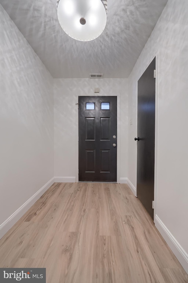 1134 Fox Run, Reading, PA 19606 - foyer entrance with wood finished floors and baseboards
