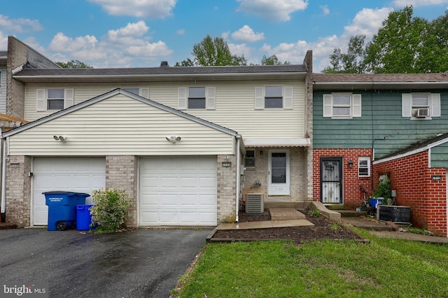 1134 Fox Run, Reading, PA 19606 - view of front of house with driveway, central AC, an attached garage, and brick siding