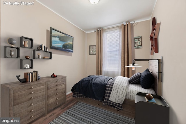 904 N Rosedale St, Baltimore, MD 21216 - bedroom featuring crown molding, wood finished floors, and baseboards