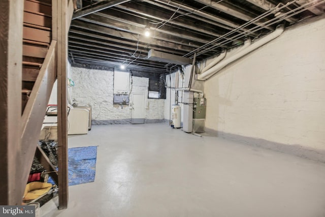 904 N Rosedale St, Baltimore, MD 21216 - unfinished basement featuring water heater and heating unit