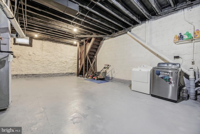 904 N Rosedale St, Baltimore, MD 21216 - unfinished below grade area featuring washer and clothes dryer