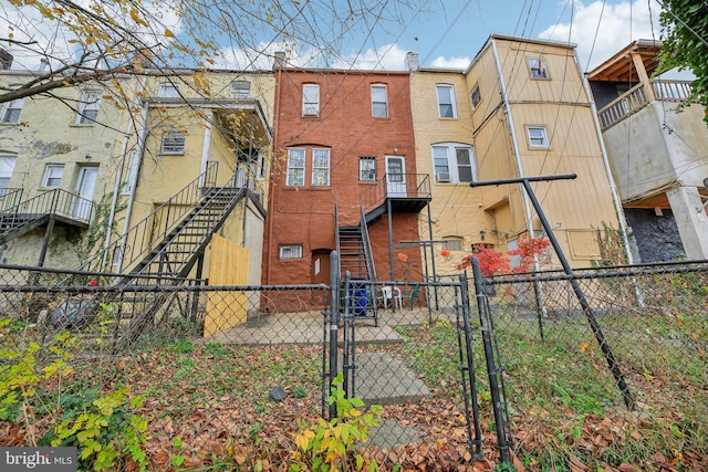 904 N Rosedale St, Baltimore, MD 21216 - back of property with a gate and stairway