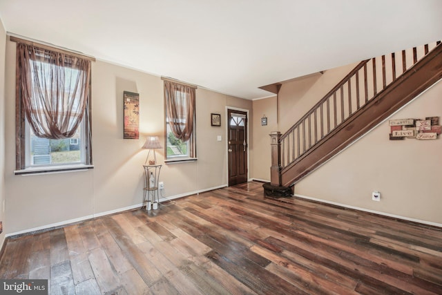 904 N Rosedale St, Baltimore, MD 21216 - entrance foyer featuring hardwood / wood-style flooring, baseboards, and stairs