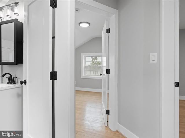 5105 11th St S, Arlington, VA 22204 - hall with baseboards, light wood-style floors, and vaulted ceiling