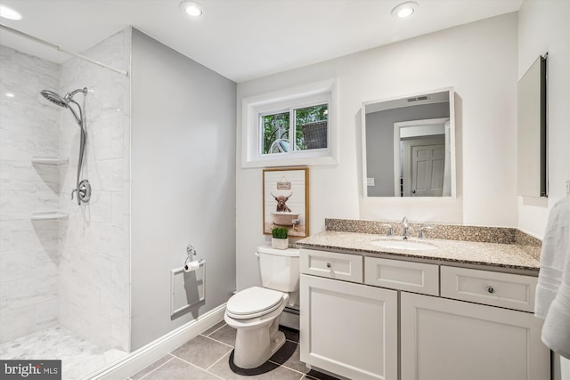 3117 Port Way, Annapolis, MD 21403 - full bathroom with toilet, vanity, tiled shower, tile patterned floors, and recessed lighting