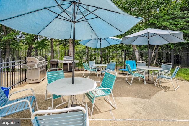 3117 Port Way, Annapolis, MD 21403 - view of patio / terrace featuring outdoor dining area, grilling area, and view of wooded area