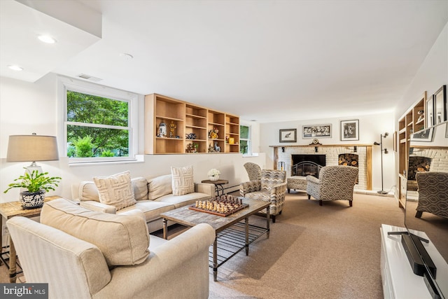 3117 Port Way, Annapolis, MD 21403 - living area featuring a brick fireplace, carpet flooring, and recessed lighting