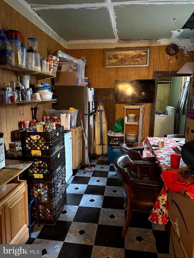 2122 W Toronto St, Philadelphia, PA 19132 - kitchen featuring wooden walls, dark floors, and brown cabinetry