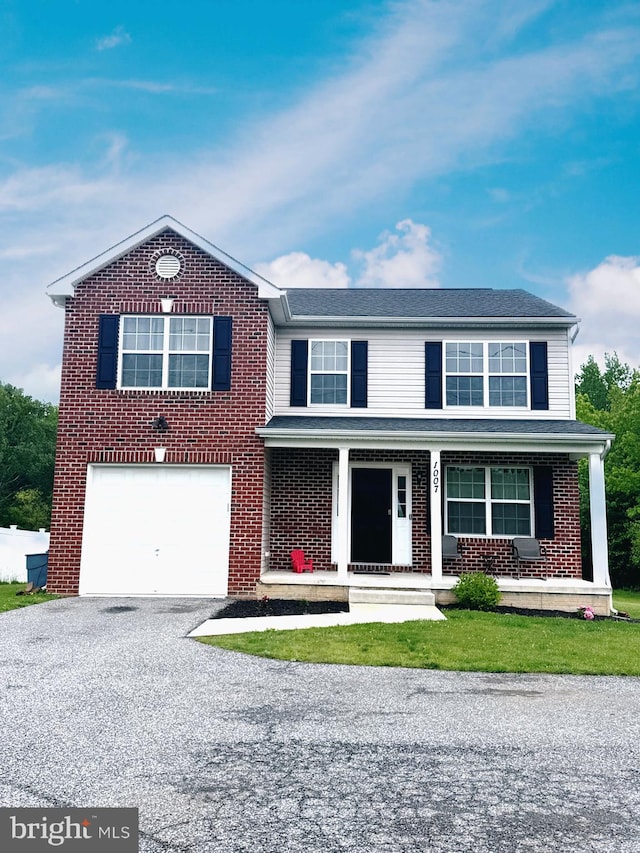 1007 Wampler Rd, Middle River, MD 21220 - traditional home with a garage, brick siding, asphalt driveway, and a porch