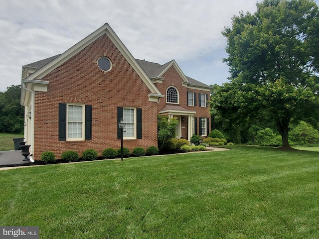 21316 Golf Estates Dr, Laytonsville, MD 20882 - colonial house with a front yard and brick siding
