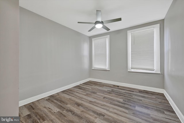 405 N Loudon Ave, Baltimore, MD 21229 - unfurnished room featuring wood finished floors, a ceiling fan, and baseboards