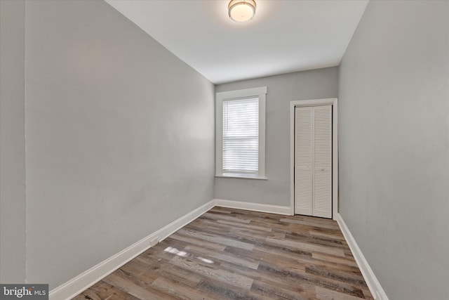 405 N Loudon Ave, Baltimore, MD 21229 - unfurnished room featuring wood finished floors and baseboards