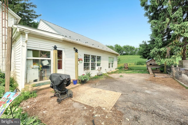 2241 Craley Rd, Windsor, PA 17366 - back of house featuring metal roof and a patio