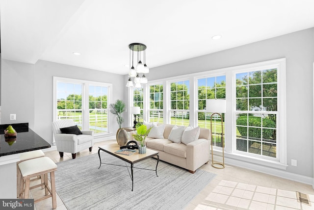41311 Silverside Dr, Leesburg, VA 20175 - living area featuring light tile patterned flooring, baseboards, and recessed lighting
