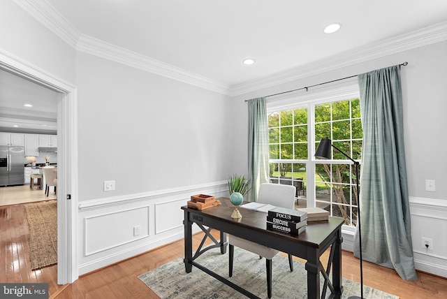 41311 Silverside Dr, Leesburg, VA 20175 - home office featuring crown molding, a wainscoted wall, light wood-style flooring, and recessed lighting