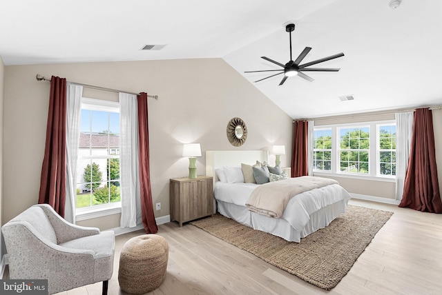 41311 Silverside Dr, Leesburg, VA 20175 - bedroom with vaulted ceiling, light wood finished floors, baseboards, and a ceiling fan