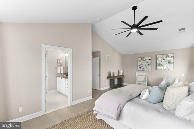 41311 Silverside Dr, Leesburg, VA 20175 - bedroom featuring light wood finished floors, lofted ceiling, baseboards, and ceiling fan