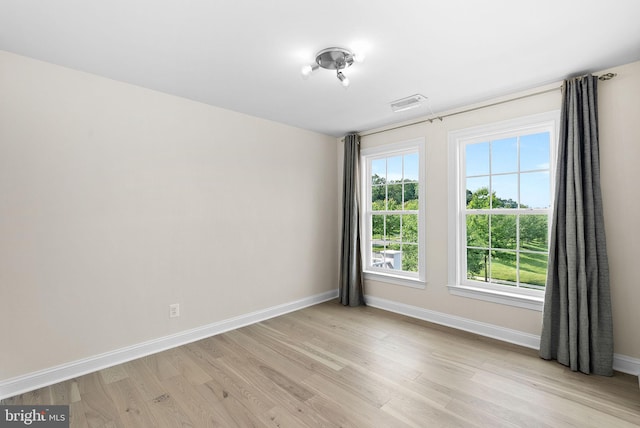41311 Silverside Dr, Leesburg, VA 20175 - unfurnished room with light wood-type flooring and baseboards