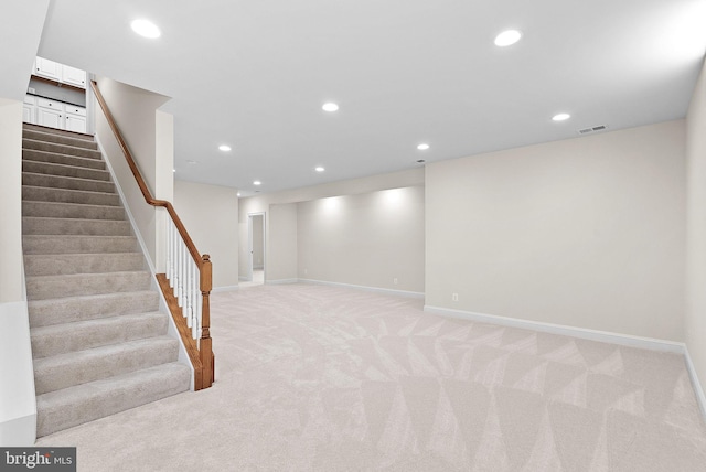 41311 Silverside Dr, Leesburg, VA 20175 - finished basement featuring light carpet, stairway, recessed lighting, and baseboards