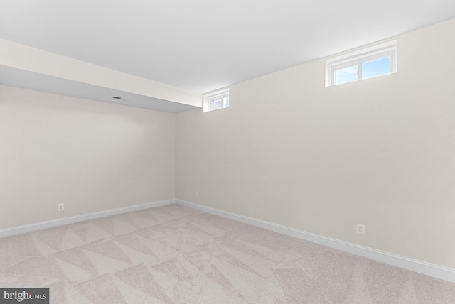 41311 Silverside Dr, Leesburg, VA 20175 - basement featuring light colored carpet and baseboards