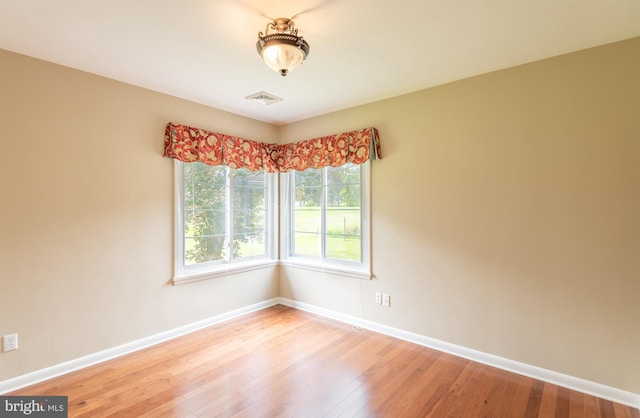 724 E Curtin St, Bellefonte, PA 16823 - empty room featuring baseboards and wood-type flooring