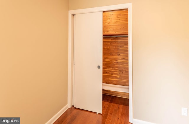 724 E Curtin St, Bellefonte, PA 16823 - unfurnished bedroom with a closet, wood finished floors, and baseboards