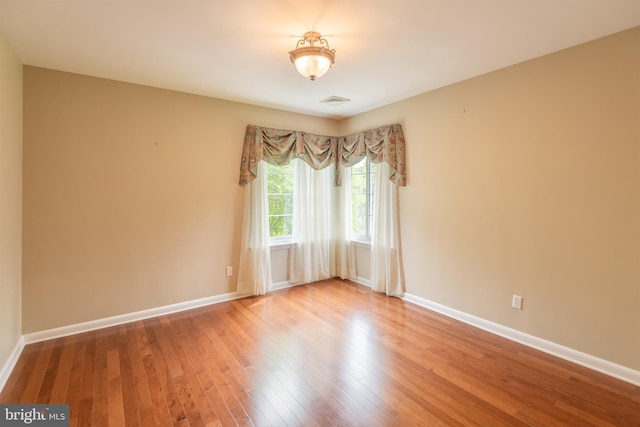 724 E Curtin St, Bellefonte, PA 16823 - spare room with hardwood / wood-style flooring and baseboards