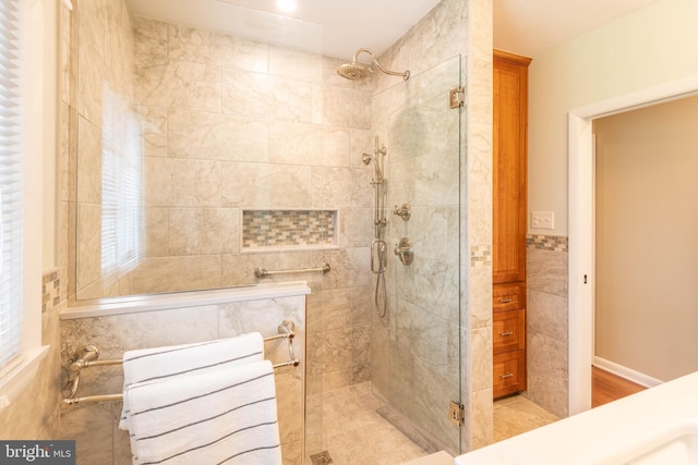 724 E Curtin St, Bellefonte, PA 16823 - bathroom with a stall shower and tile walls