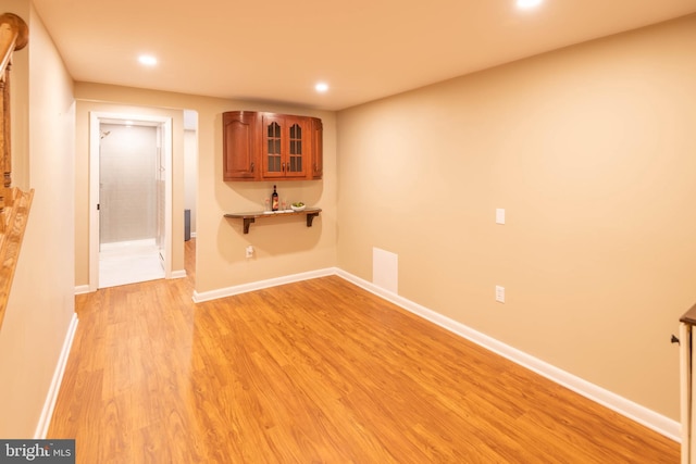 724 E Curtin St, Bellefonte, PA 16823 - below grade area featuring recessed lighting, light wood finished floors, and baseboards