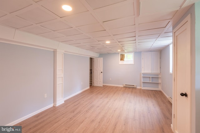 724 E Curtin St, Bellefonte, PA 16823 - basement with a baseboard radiator, light wood-type flooring, baseboards, and recessed lighting
