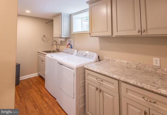 724 E Curtin St, Bellefonte, PA 16823 - washroom with independent washer and dryer, wood finished floors, cabinet space, baseboards, and recessed lighting
