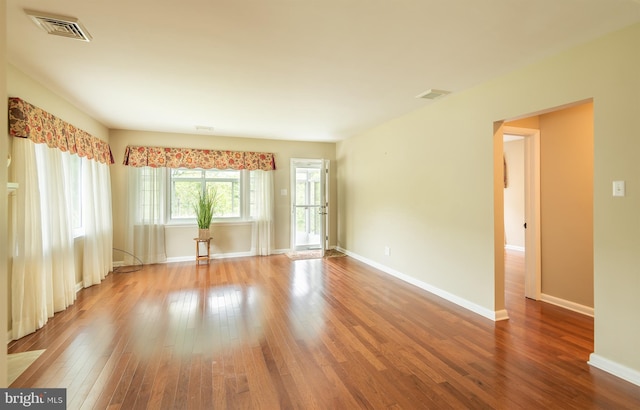 724 E Curtin St, Bellefonte, PA 16823 - spare room featuring wood-type flooring and baseboards