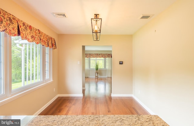 724 E Curtin St, Bellefonte, PA 16823 - hallway featuring wood finished floors and baseboards