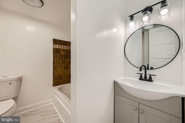 1402 W Lombard St, Baltimore, MD 21223 - full bath with toilet, marble look tile flooring, vanity, and baseboards