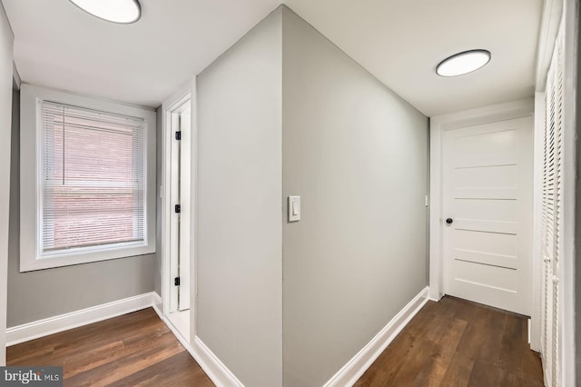1402 W Lombard St, Baltimore, MD 21223 - hallway with wood finished floors and baseboards