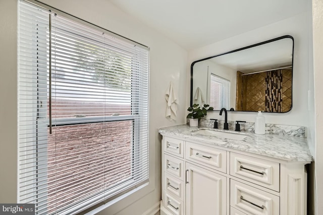 1402 W Lombard St, Baltimore, MD 21223 - full bath with vanity and plenty of natural light