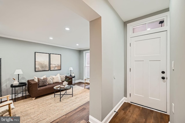 1402 W Lombard St, Baltimore, MD 21223 - foyer entrance with dark wood-style flooring, baseboards, recessed lighting, and crown molding