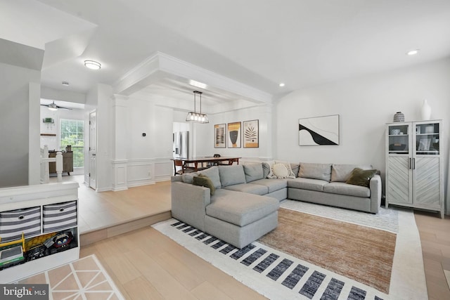 47686 Sandbank Sq, Sterling, VA 20165 - living room with wood finished floors, recessed lighting, a wainscoted wall, ceiling fan, and a decorative wall