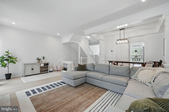 47686 Sandbank Sq, Sterling, VA 20165 - living area featuring stairs, recessed lighting, wood finished floors, ornamental molding, and a chandelier