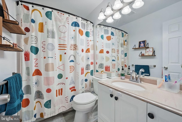 47686 Sandbank Sq, Sterling, VA 20165 - bathroom featuring vanity, toilet, a shower with shower curtain, and wood finished floors