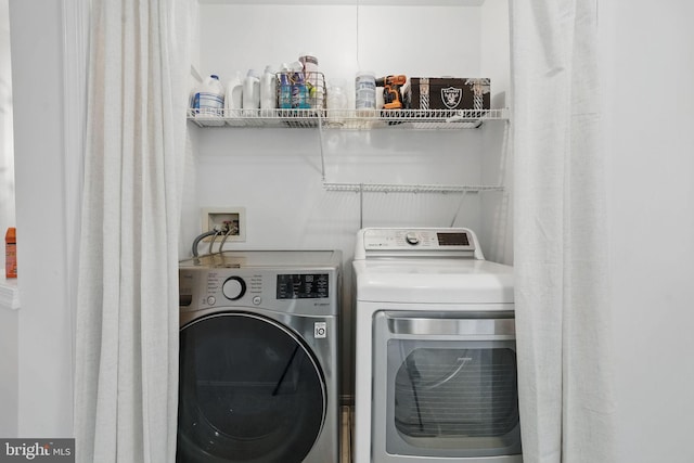 47686 Sandbank Sq, Sterling, VA 20165 - laundry area featuring washer and clothes dryer