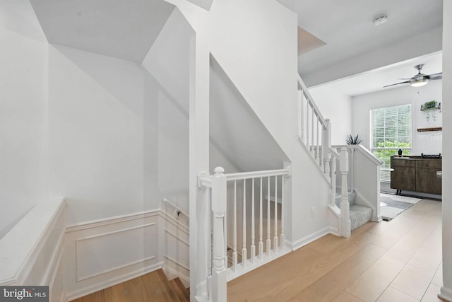 47686 Sandbank Sq, Sterling, VA 20165 - stairs featuring wood finished floors, ceiling fan, and wainscoting