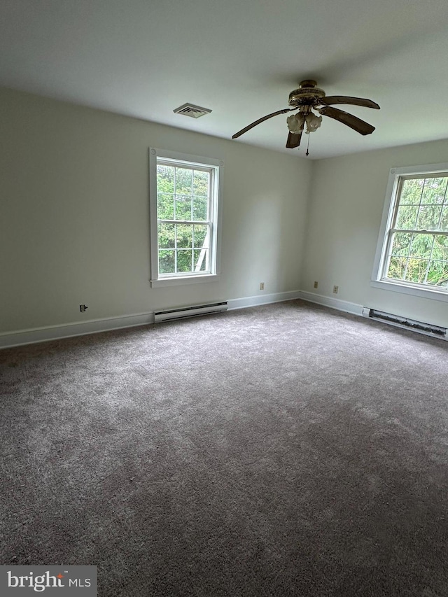 11 Pony Rd, Bridgeton, NJ 08302 - spare room featuring a baseboard heating unit, carpet, a ceiling fan, and baseboards