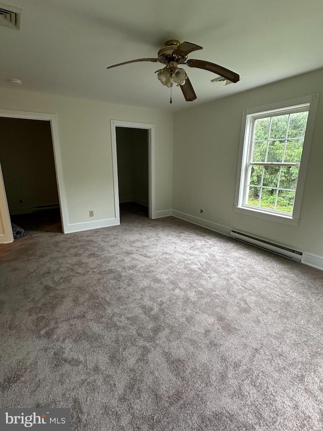 11 Pony Rd, Bridgeton, NJ 08302 - spare room with a baseboard heating unit, a ceiling fan, carpet flooring, and baseboards