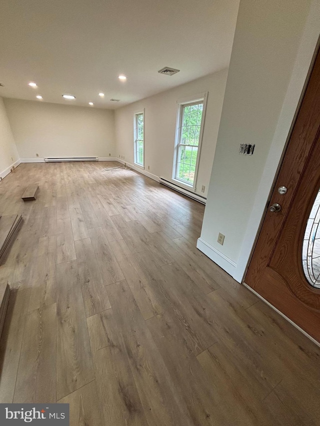 11 Pony Rd, Bridgeton, NJ 08302 - spare room featuring wood finished floors, baseboards, baseboard heating, and recessed lighting