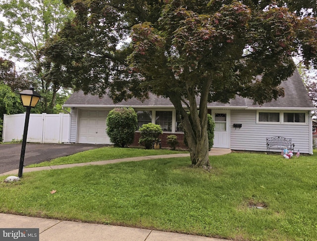 116 Queen Lily Rd, Levittown, PA 19057 - view of front facade with asphalt driveway and roof with shingles
